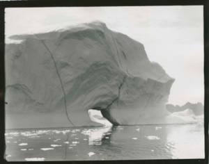 Image: Iceberg with hole at water line